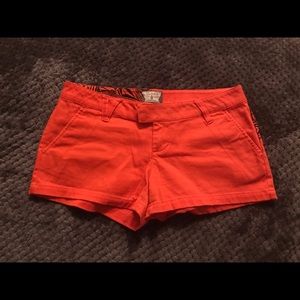 Red Volcom shorts